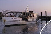 Oyster boat at dusk - USA Oyster Fishery
