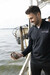 Raz Halili holding oyster - USA Oyster Fishery