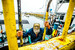 Jack Vantress climbing onto fishing boat - AAFA fishery